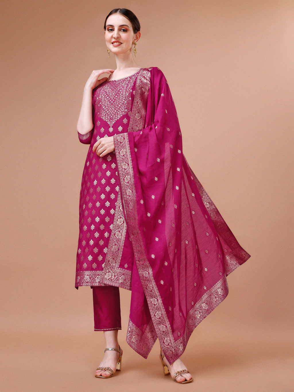 A beautiful multicolor pure muslin jacquard kurta paired with matching pants and a dupatta, styled for an ethnic look.