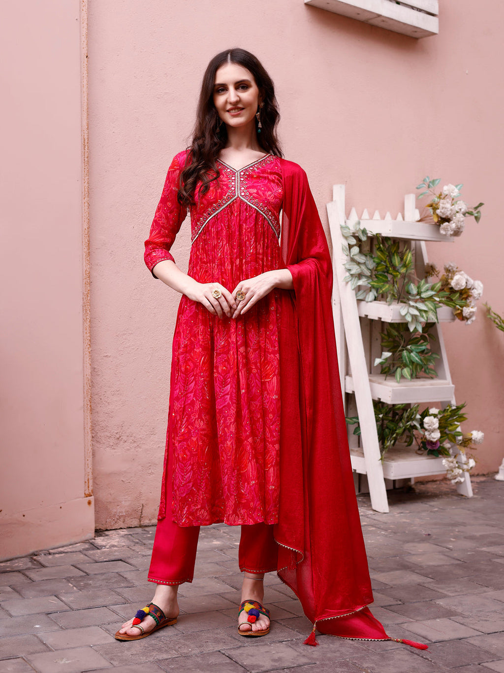 Model wearing a multicolor Alia Cut hand embroidered floral kurta set with matching pant and dupatta