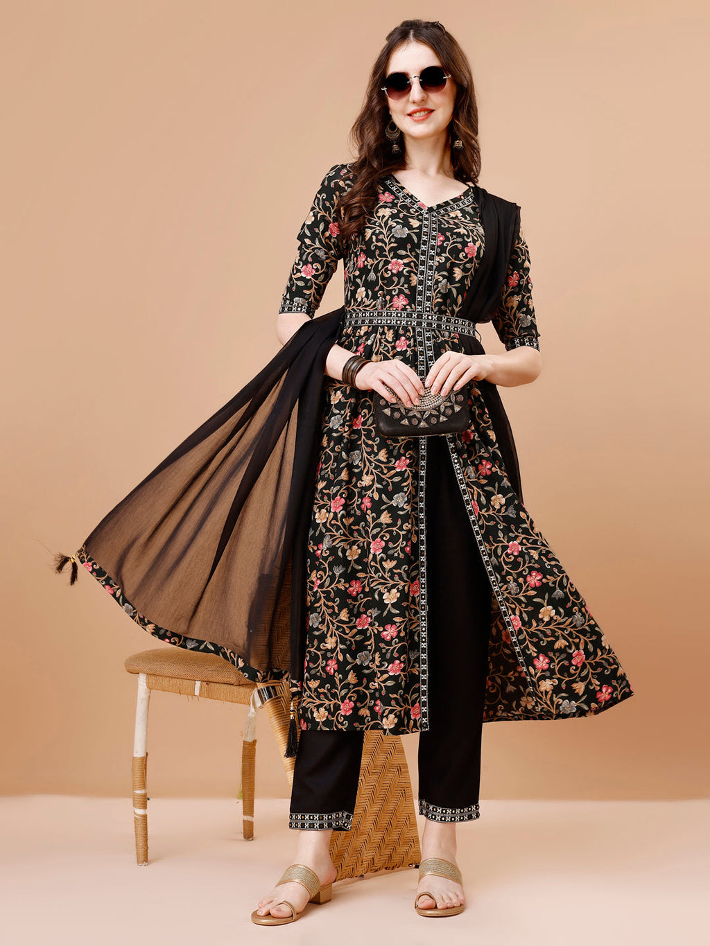 Multicolor embroidered floral kurta set featuring a front slit, pants, dupatta, and belt.