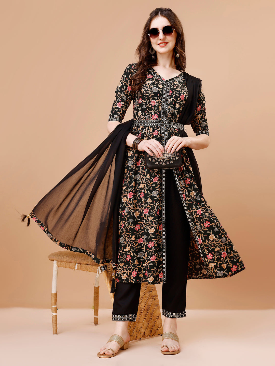 Multicolor embroidered floral kurta set featuring a front slit, pants, dupatta, and belt.
