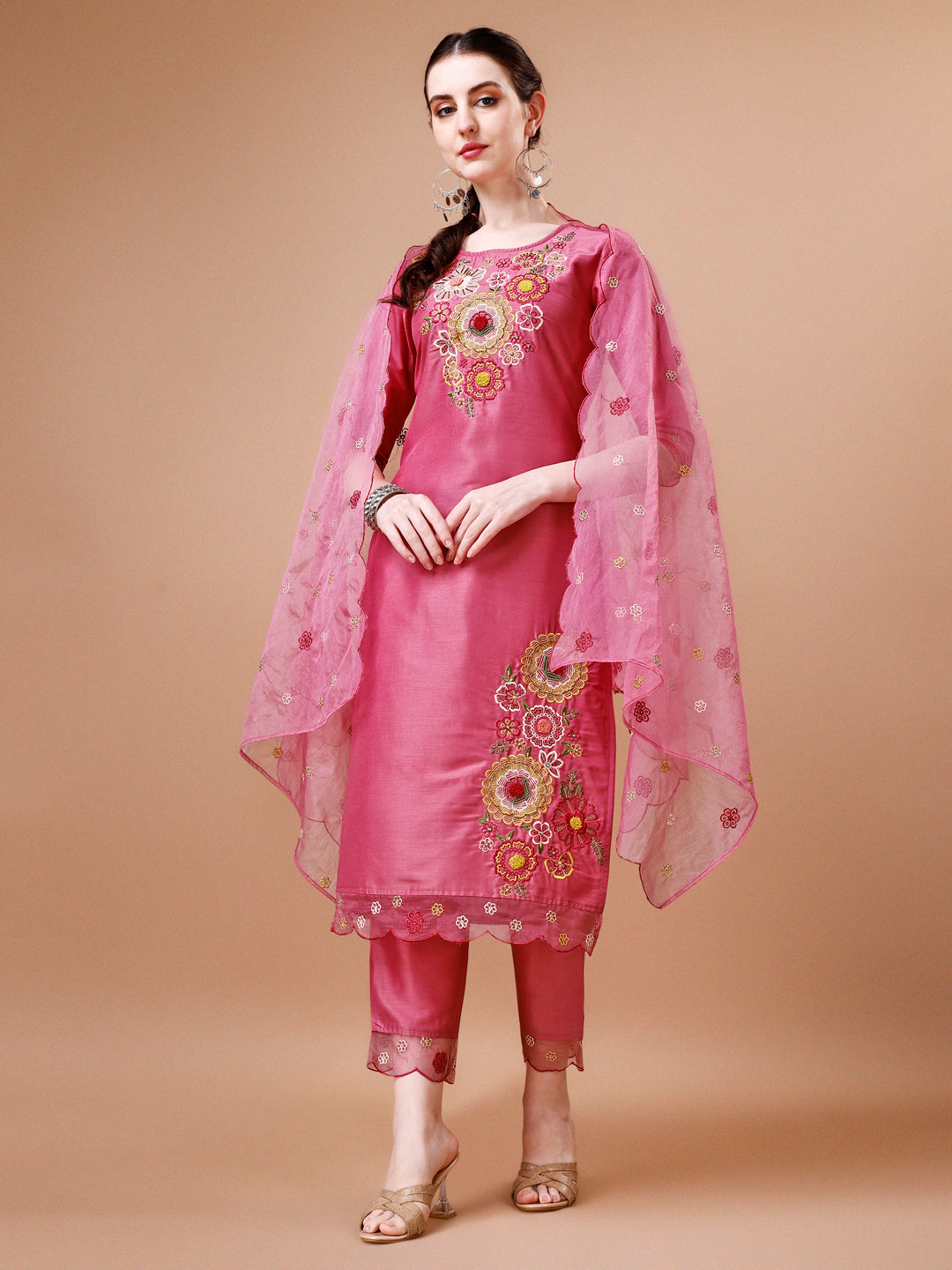 Multicolor hand-embroidered rayon kurta set paired with an elegant organza dupatta.