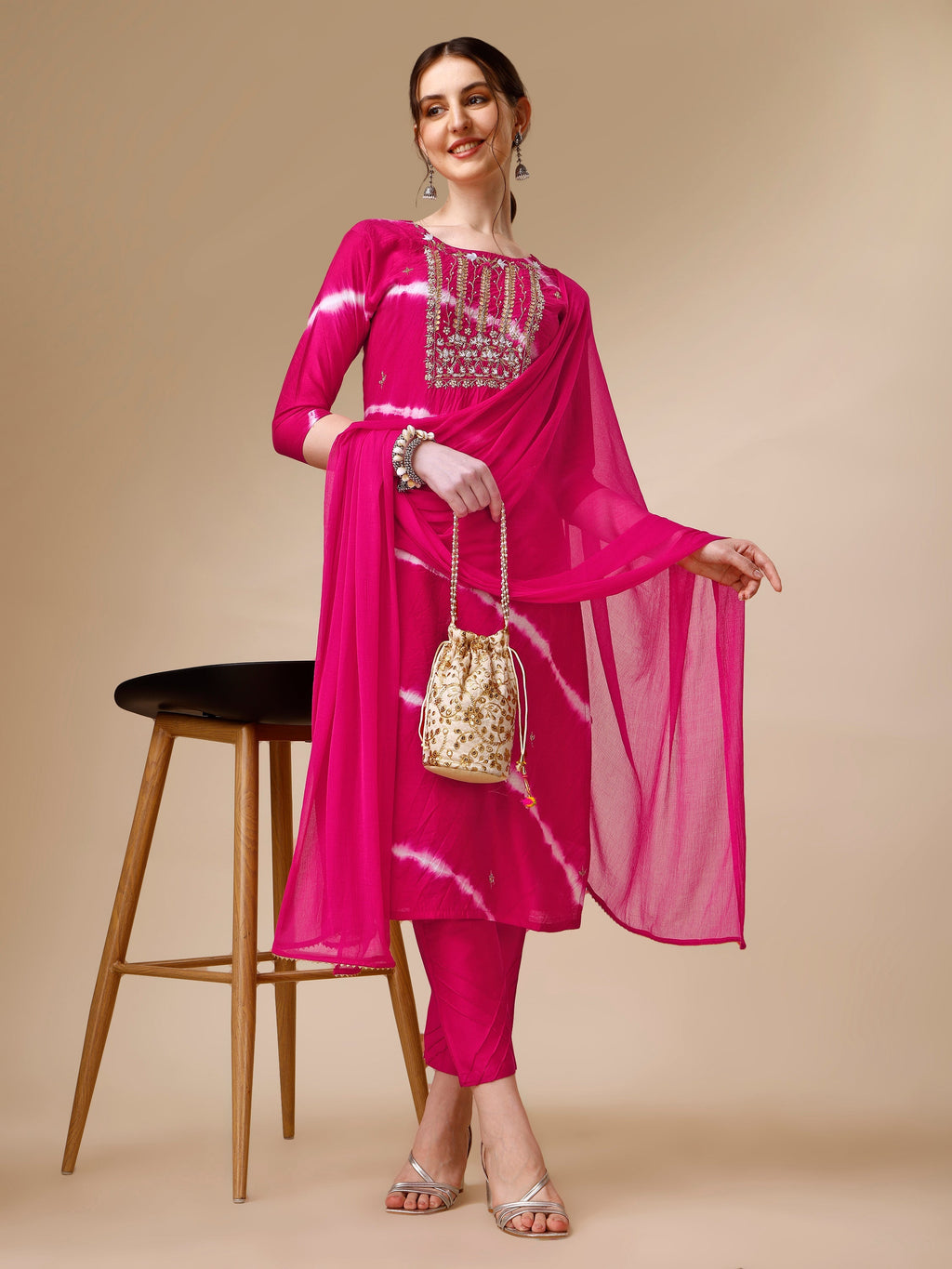 Multicolor Lehariya printed kurta with matching pants and dupatta made of rayon.