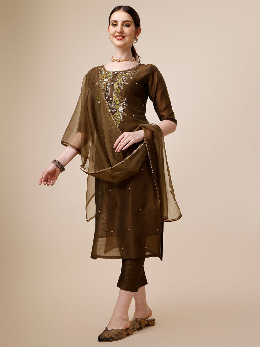 Multicolor embroidered green kurta set with pants and matching dupatta in soft rayon fabric
