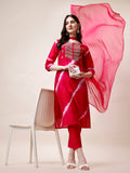 Woman wearing a multicolor embroidered Leheriya printed kurta set with matching pants and dupatta.