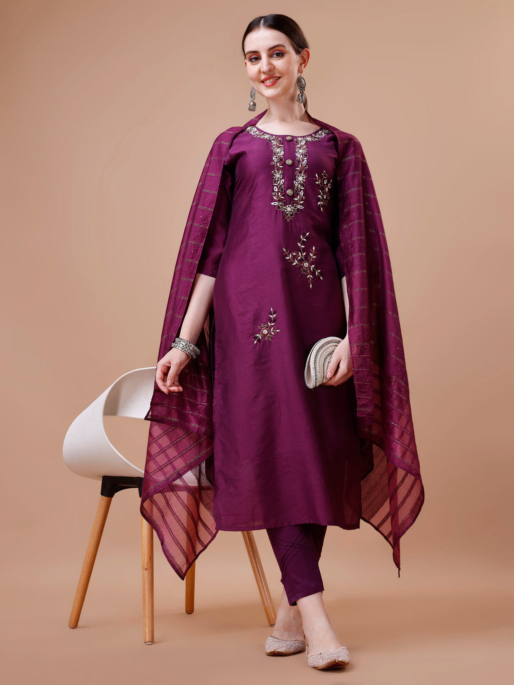 Close up of placement hand embroidery on a multicolor rayon kurta set