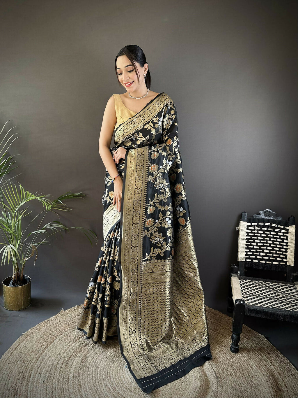Black soft silk Banarasi saree with intricate Meenakari floral and ethnic motif designs