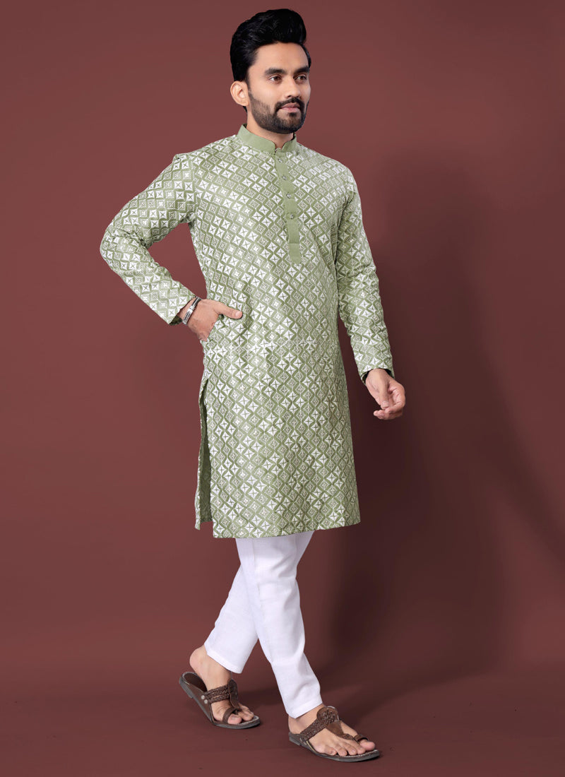 Men wearing a Light Pista silk kurta with geometric thread embroidery detailing
