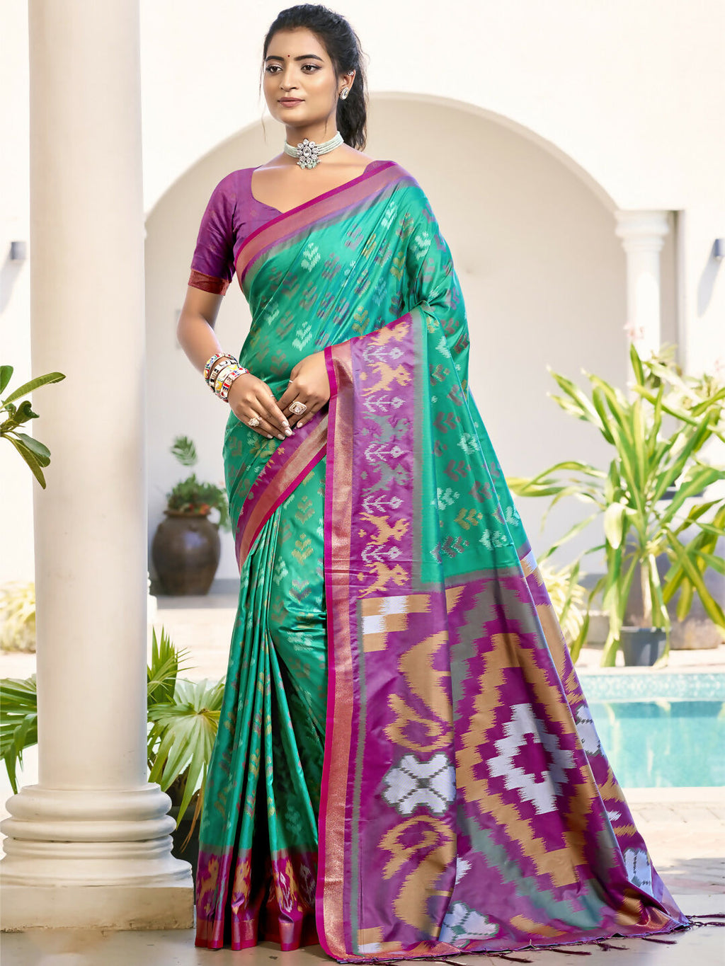 Rama Green Pochampalli Silk Saree with contrasting pink blouse