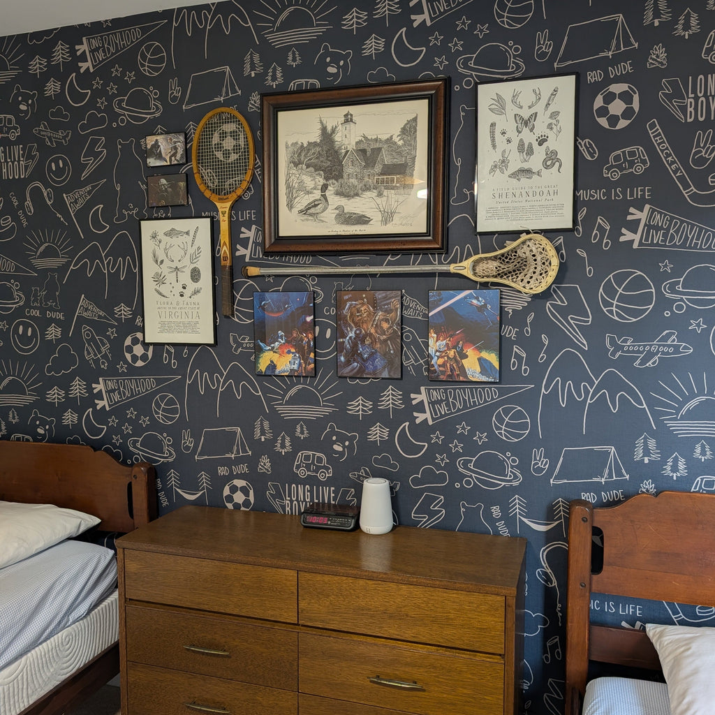Ozzy wallpaper with an abstract design in navy and white for a bohemian aesthetic.
