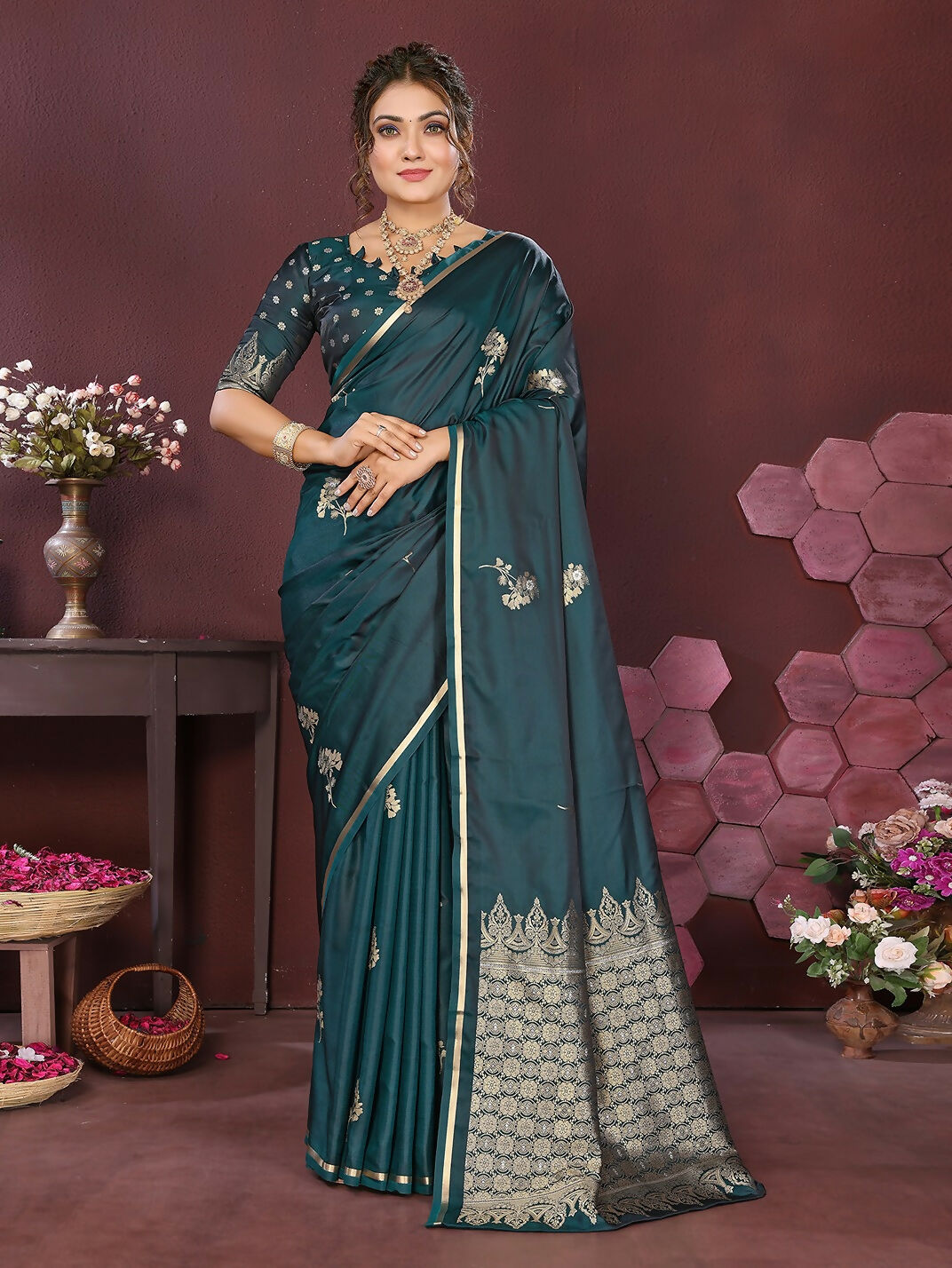 Teal satin silk saree with floral prints and matching unstitched blouse