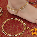 High Gold Polish Fancy Designer Payal for women and girls featuring intricate stone and bead detailing