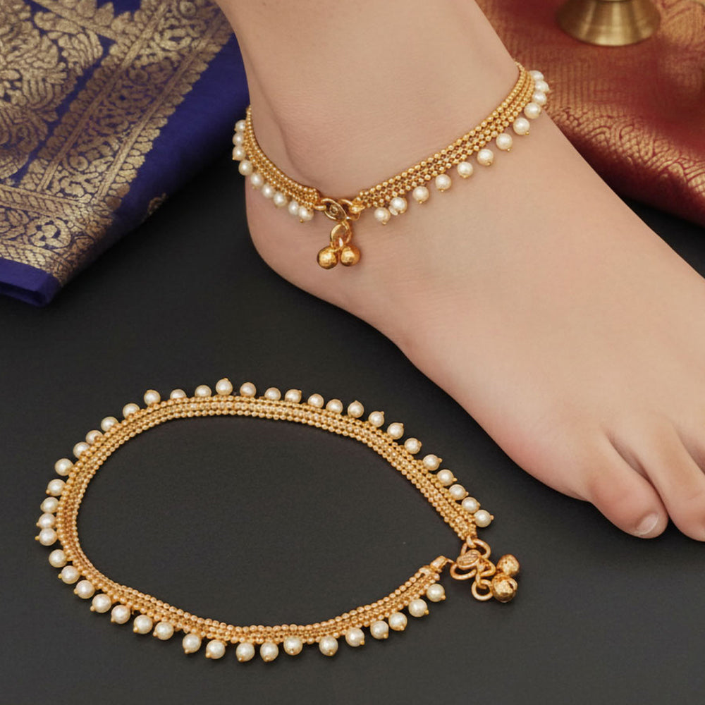 Close up of premium high gold party wear payal with stone and bead details for women and girls