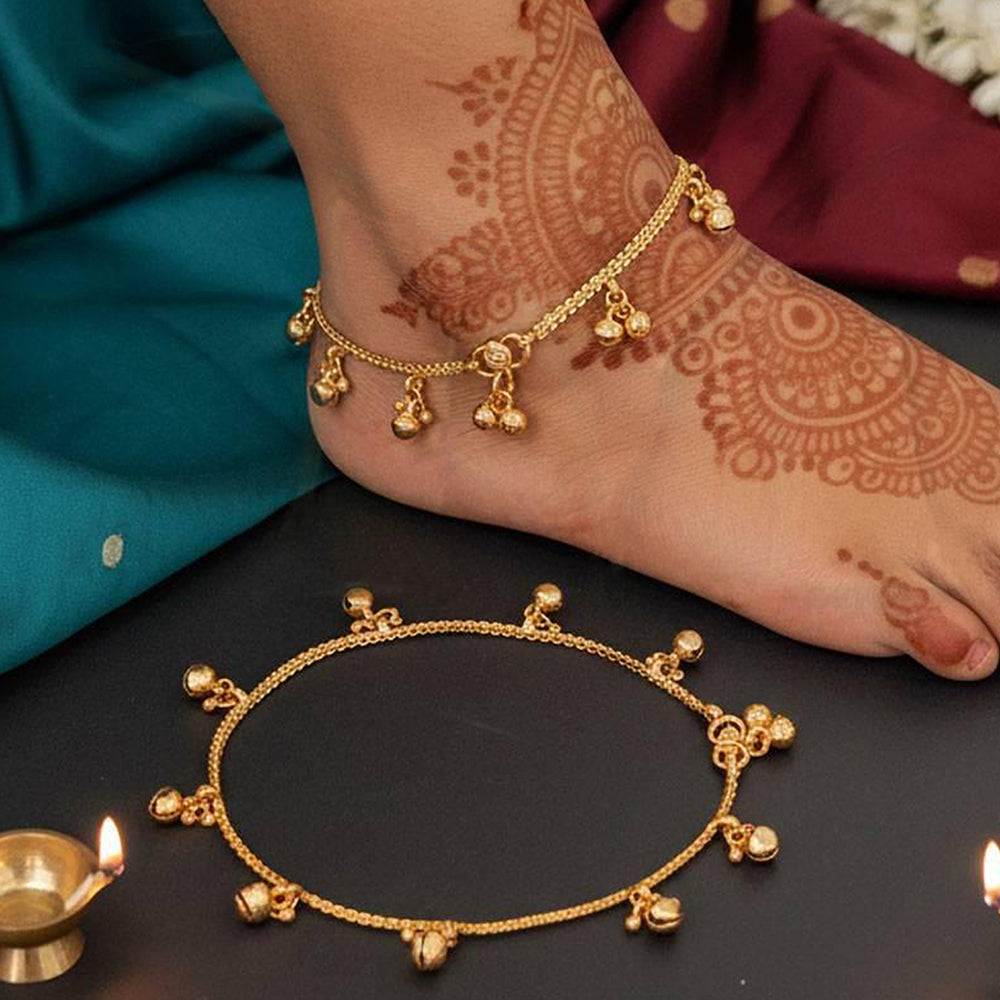 Traditional gold-toned ghungroo dangle anklet for girls on a neutral background