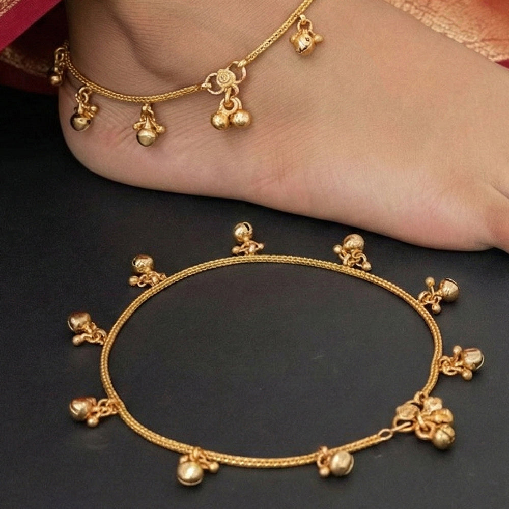 Traditional ghungroo dangler payal set for baby girls featuring layered gold-tone chains and small bells.