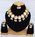 White Kundan stone necklace set with gold plated finish