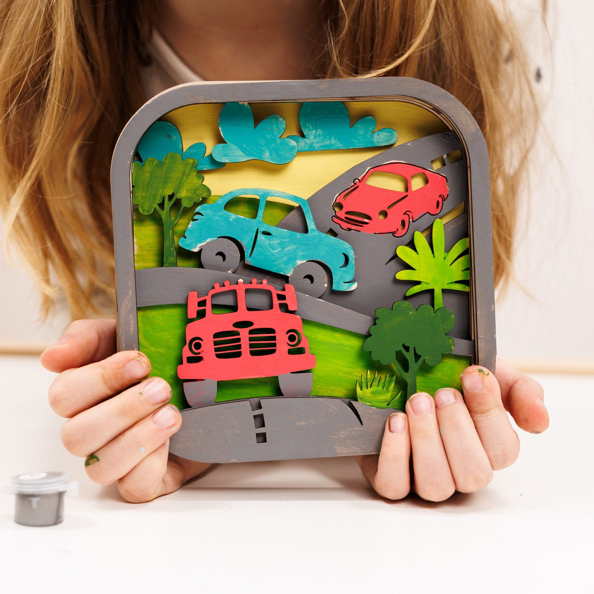 3D DIY Wood Painting Kit for Kids featuring car designs with non-toxic paints and wooden assembly pieces.