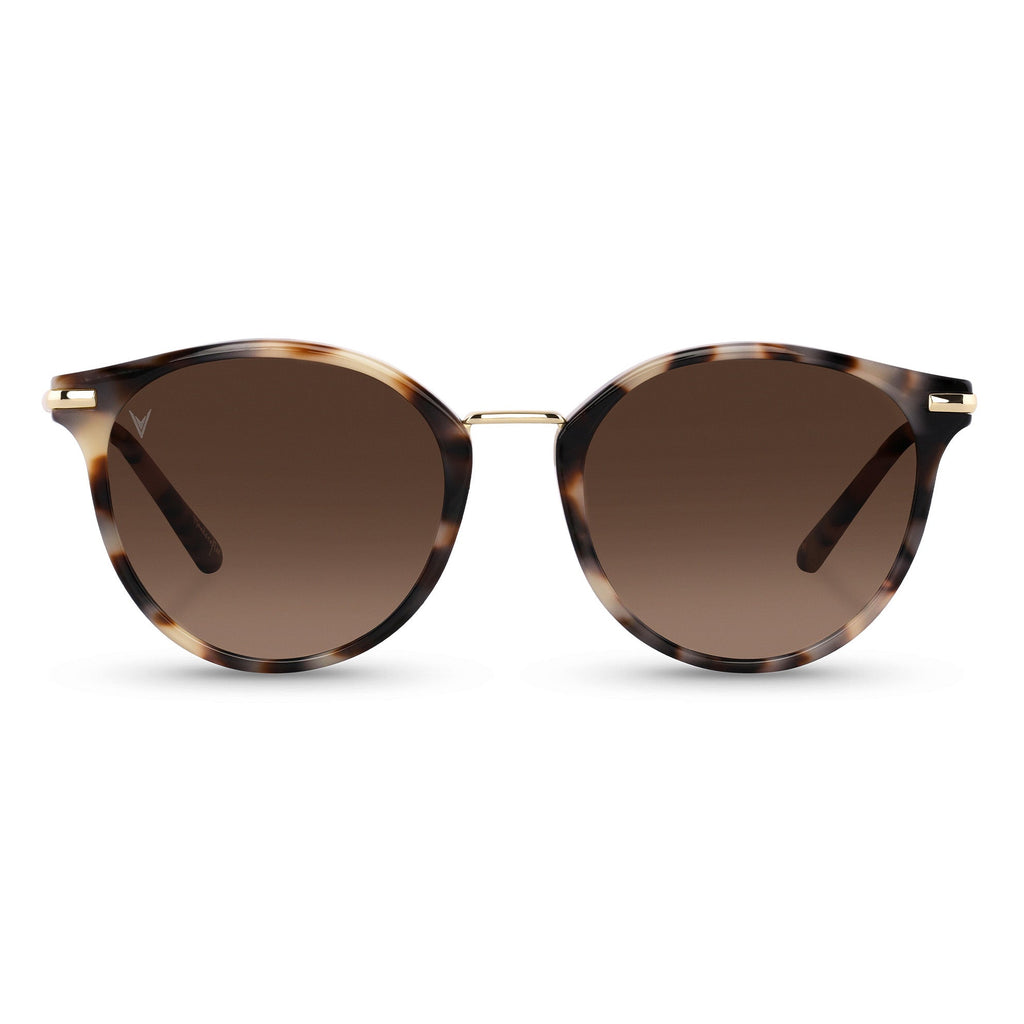 The Pali sunglasses in Ivory Tort with Italian acetate frames and polarized lenses.