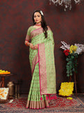 Parotgreen soft Katan silk saree featuring rich zari weaving on the pallu.