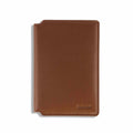 Premium Italian leather passport wallet in Saddle color featuring card slots and document sleeve.