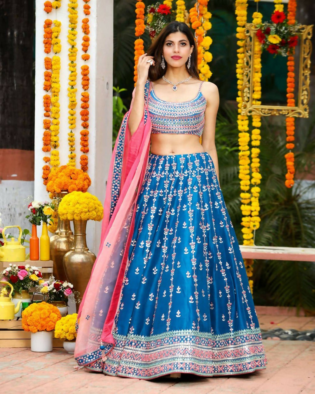 Blue Chinon lehenga choli with extensive sequins and Zari thread embroidery