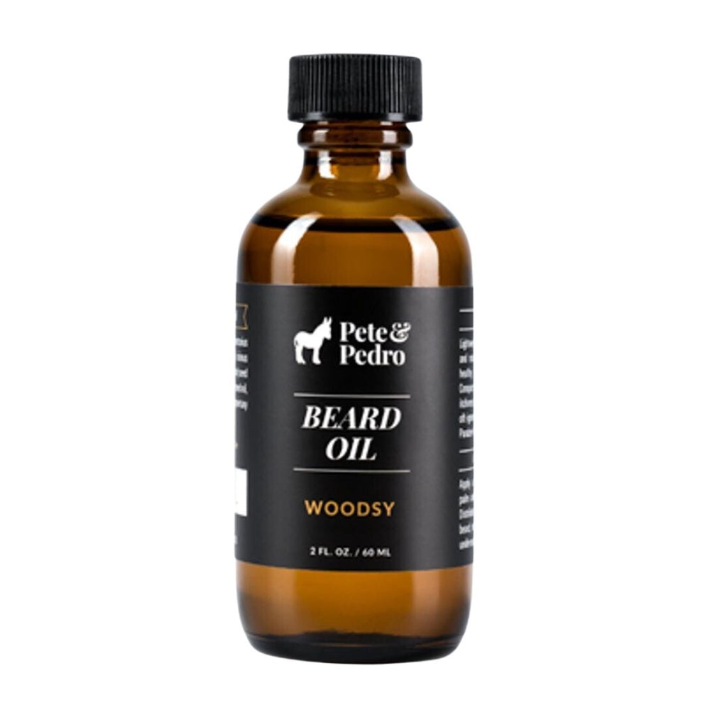 A 2 oz bottle of Pete & Pedro Woodsy Beard Oil on a white background.