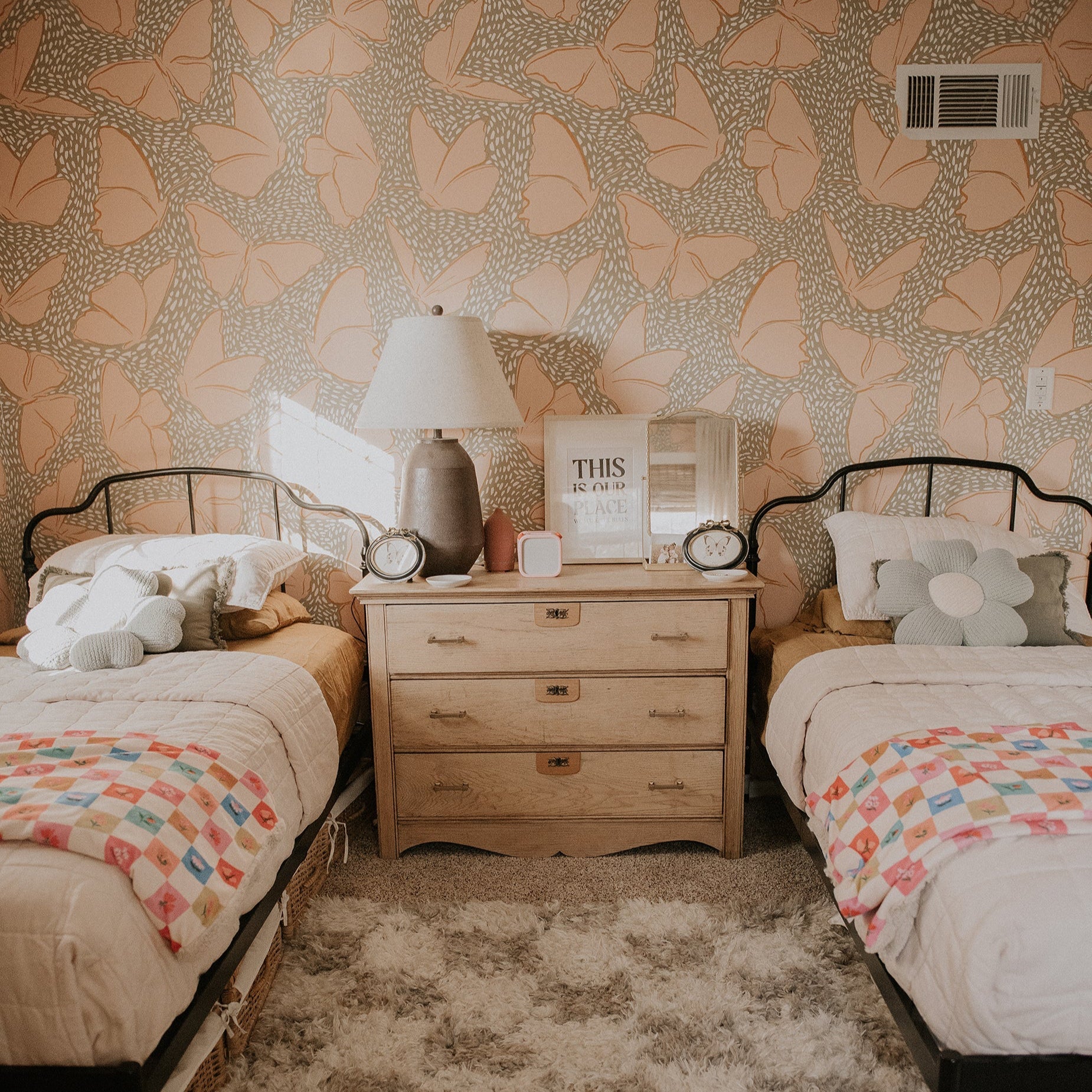 Ellie removable wallpaper in blush pink and sage green with a whimsical bohemian pattern