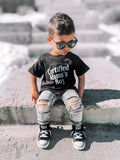 Kids wearing a minimalist black or white Certified Mama's Boy crewneck t-shirt