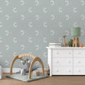 Minimalist Sol geometric wallpaper in sage-green and terracotta tones.