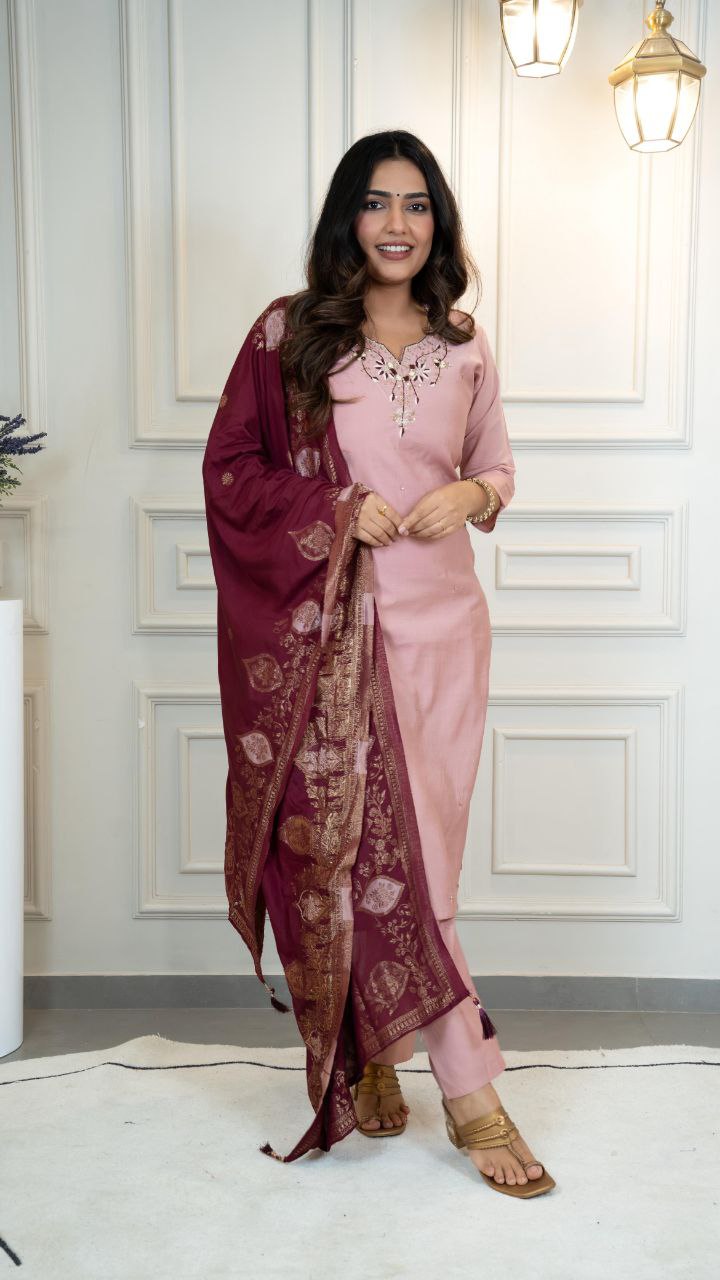 Front view of a pink Roman Silk kurta set with intricate hand work, paired with matching pants and dupatta.