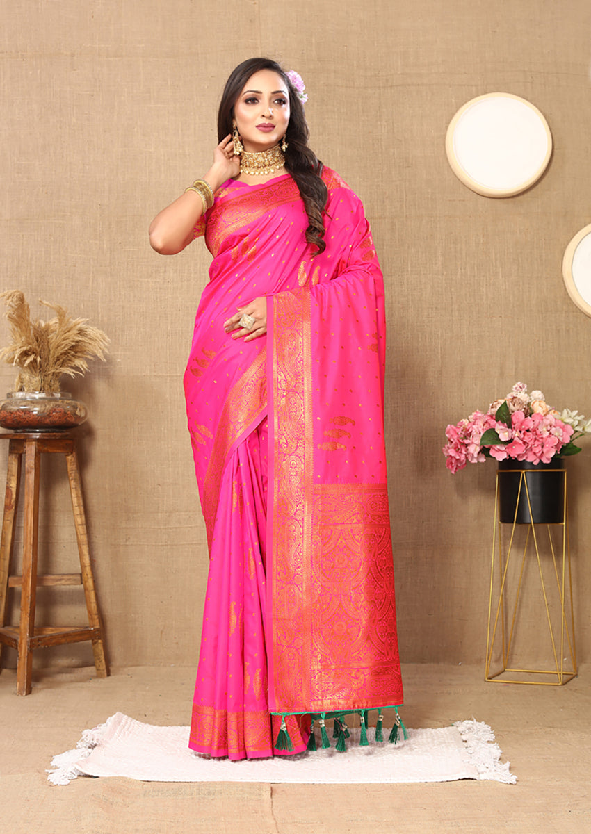 Pink soft silk saree with intricate copper zari woven designs.