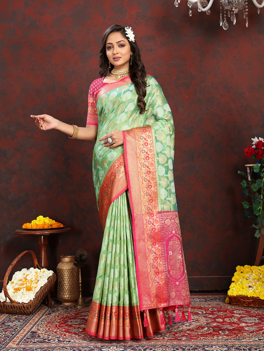 Pista green and fuchsia pink silk saree with rich Meenakari woven pallu