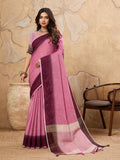 A beautiful Rani Pink linen saree with matching blouse draped elegantly.