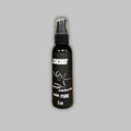2oz bottle of premium pure doe urine with deer antler graphic label in black packaging