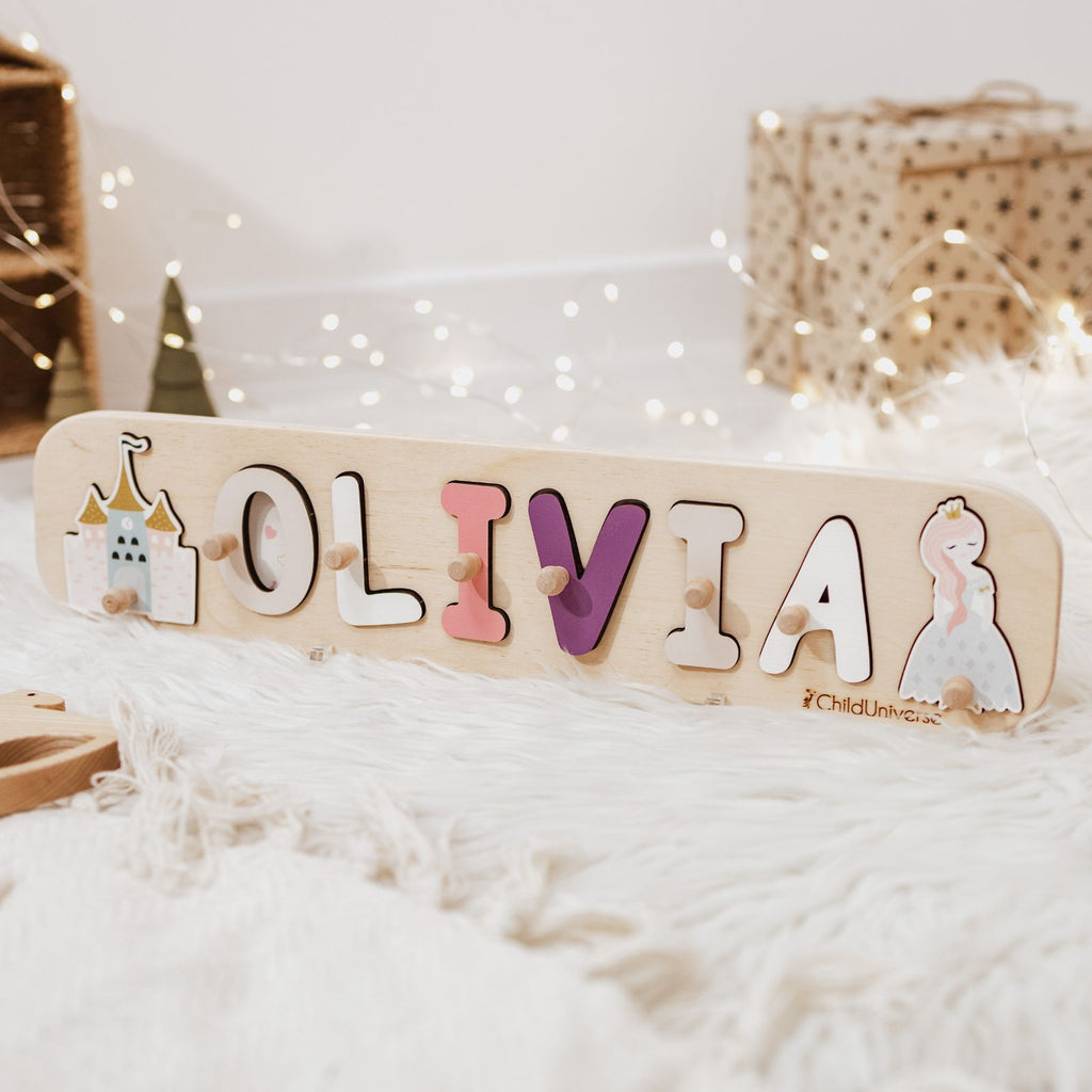 Personalized wooden princess name puzzle for toddlers on a white background