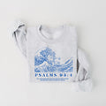 Relaxed fit knit pullover featuring Psalms 93:4 screen printed design in grey and blue