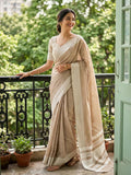 Elegant lite brown linen saree with matching blouse piece
