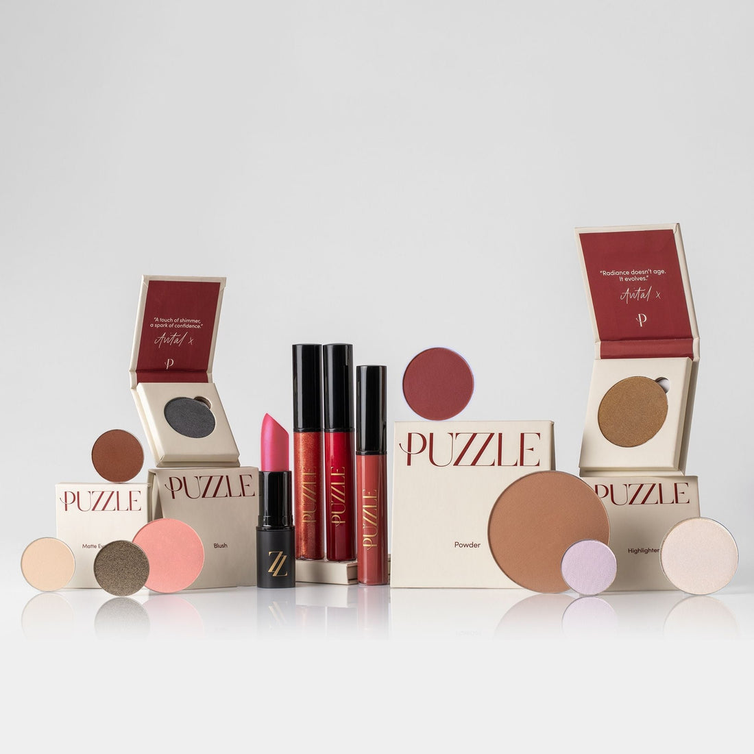 The Rule Breakers Set featuring eyeshadows, blush, and highlighter in nude, pink, red, and lavender tones.