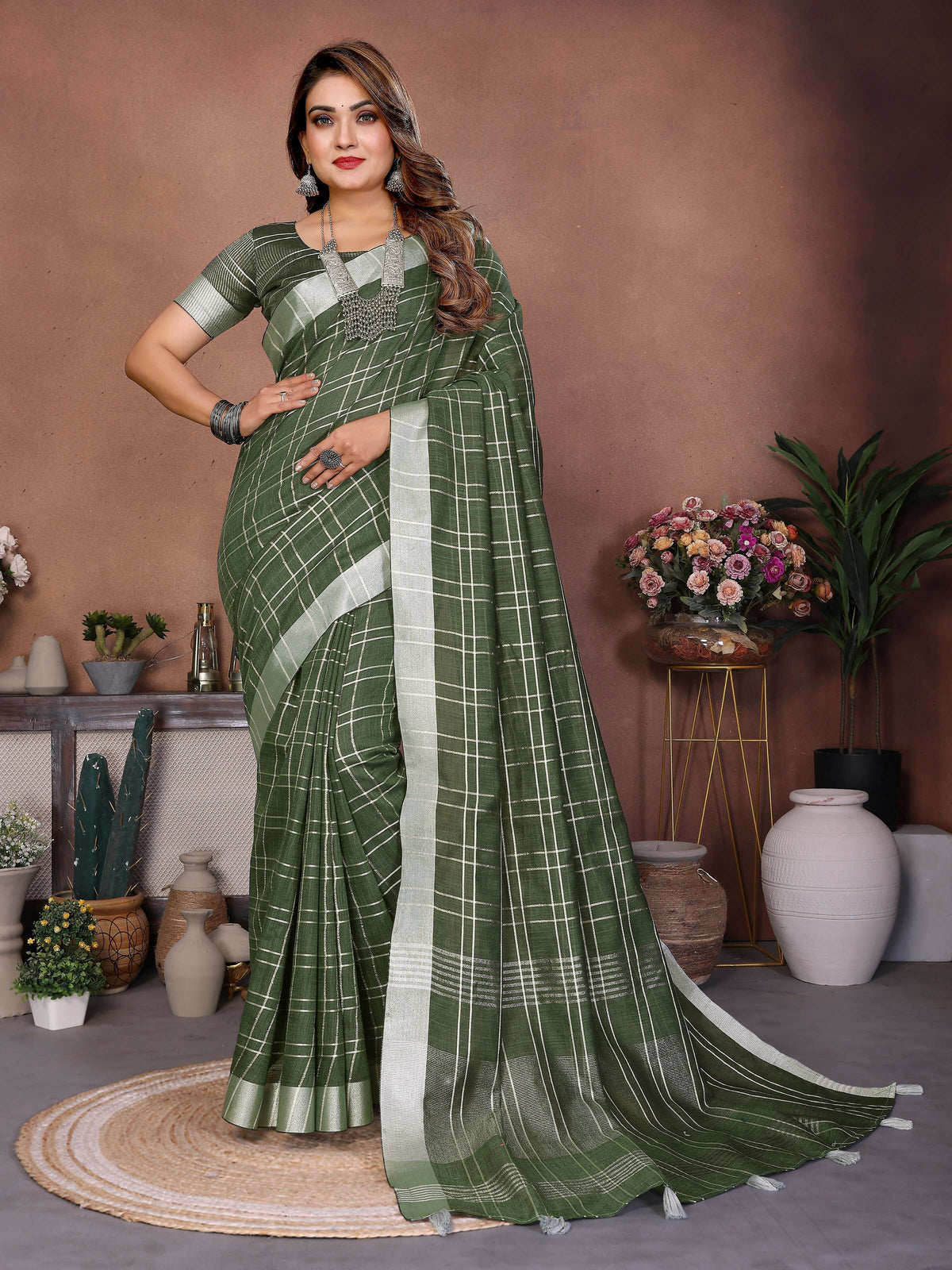 A beautiful Mehndi-colored linen saree with traditional weaving, 5.5 meters length.
