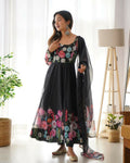 A black organza kurta set featuring elegant sequin embroidery work and matching cotton bottom.