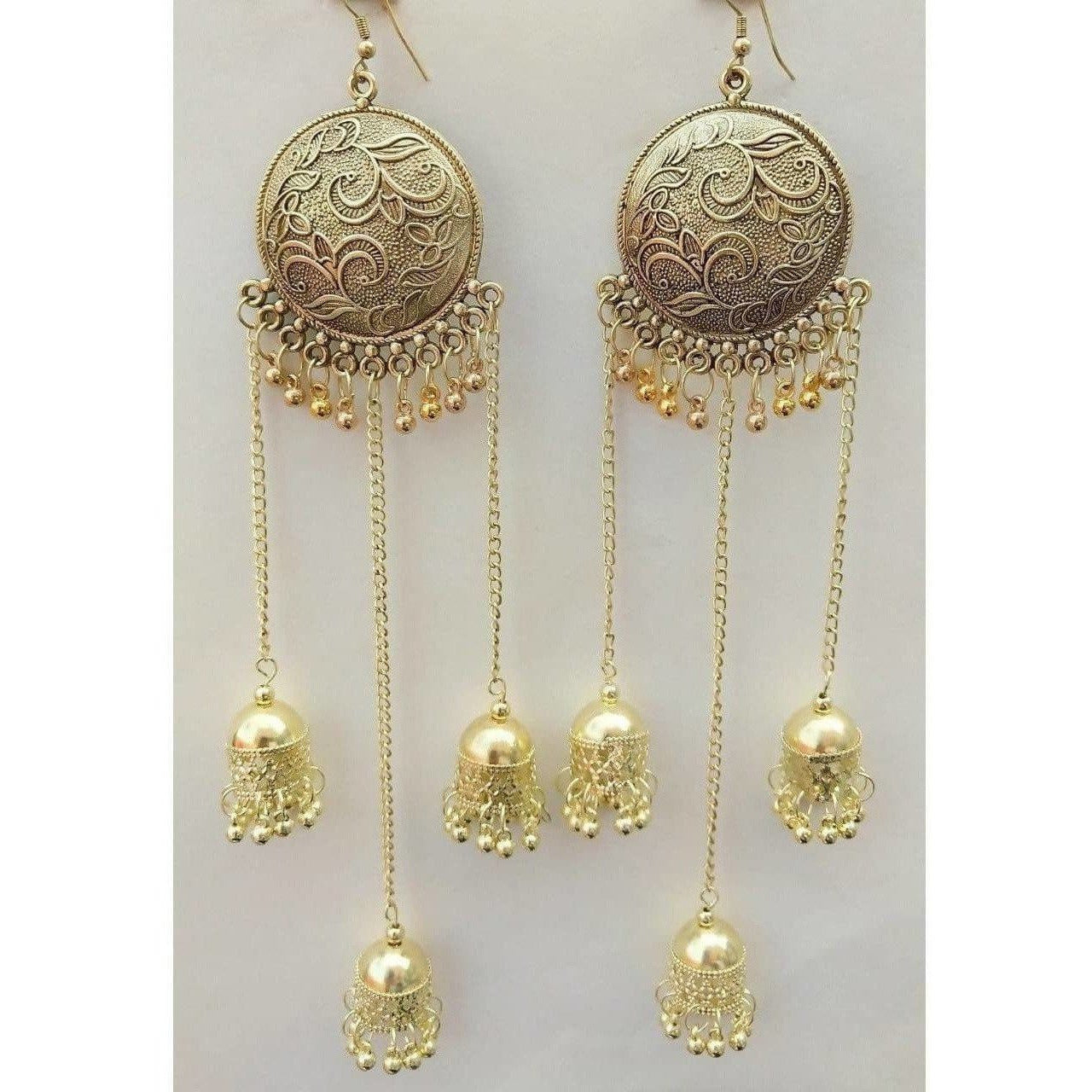Gold-plated Bahubali style long hanging jhumkas with sun motif and tassels.