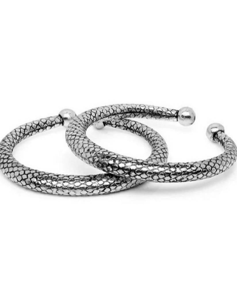 A pair of intricate oxidized silver-plated Rajasthani Kada anklets for women