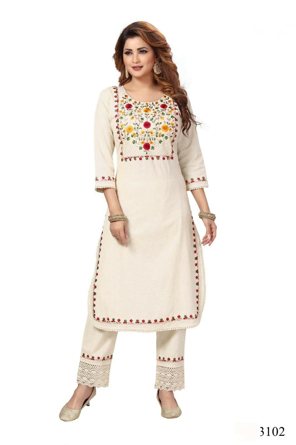 Woman wearing a beige cotton 2-piece long kurta set with matching bottoms