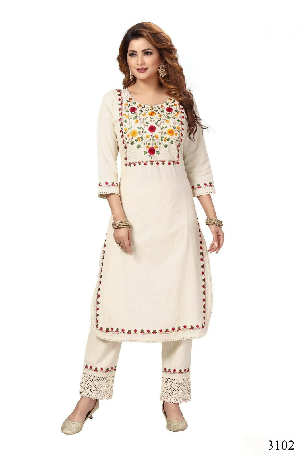 Woman wearing a beige cotton 2-piece long kurta set with matching bottoms