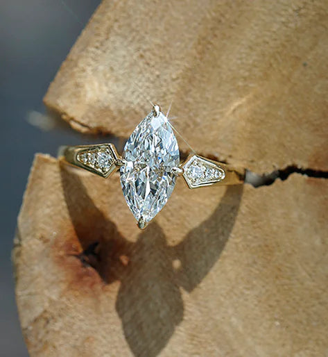 Marquise Cut Lab-Created Sapphire Ring in 18K Gold