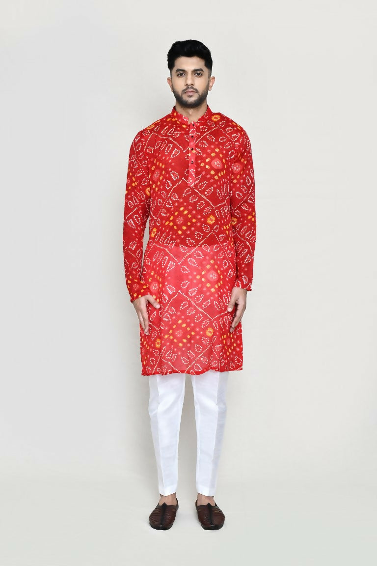 Elegant red kurta made of Georgette fabric paired with matching straight-fit trousers.