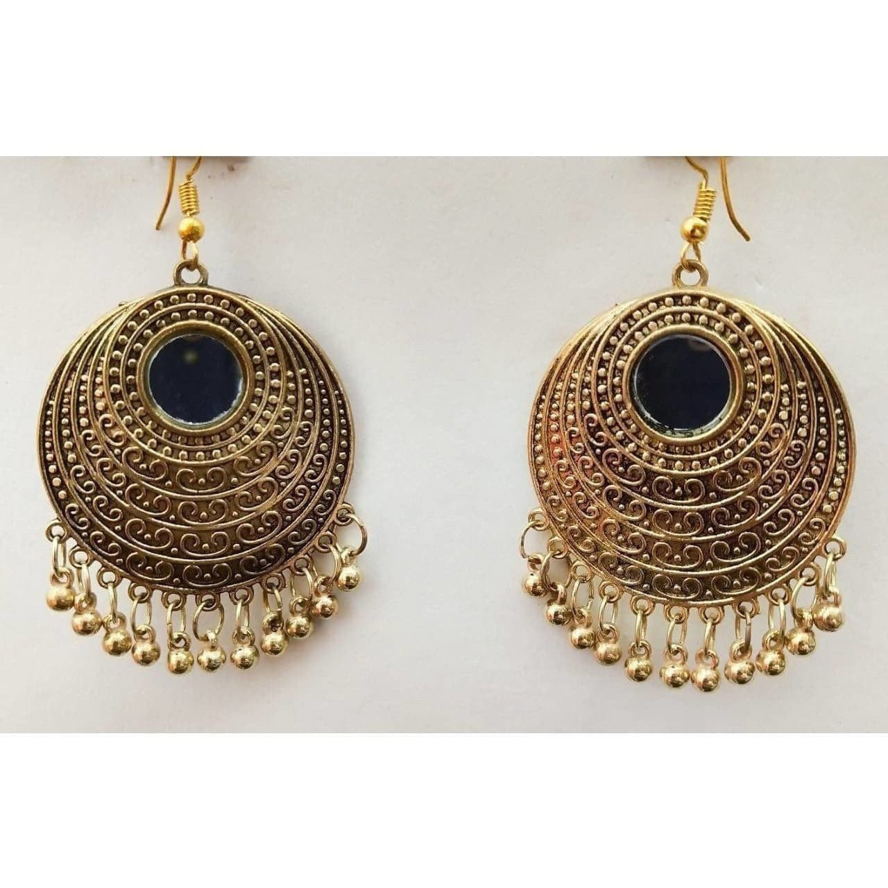 Traditional gold-plated Chandbali earrings with mirror work and gold drops.
