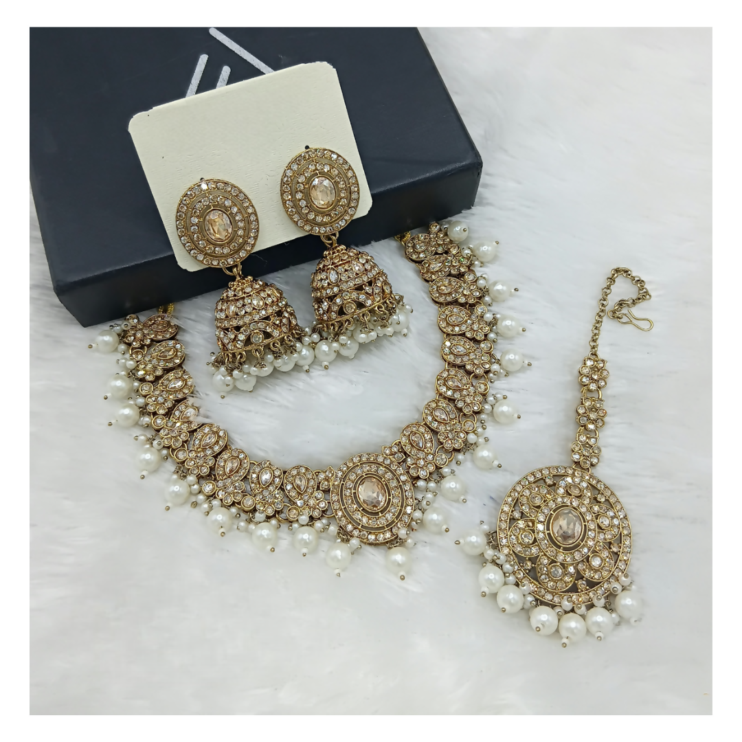 Minimalist cream stone work necklace set with matching earrings for an elegant ethnic look.