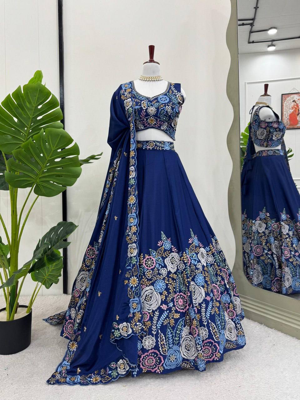 Elegant blue Chinon Silk wedding lehenga choli featuring detailed thread and sequence work.