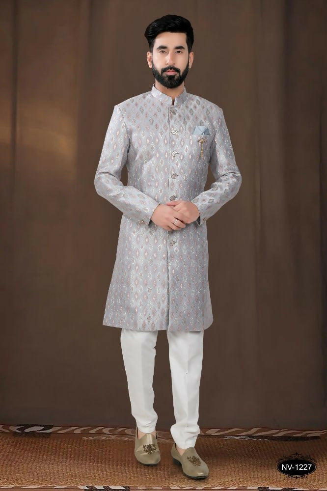 A stylish grey woven jacquard kurta paired with white pyjamas for boys