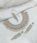 White stone work necklace set with delicate pattern and matching jewelry